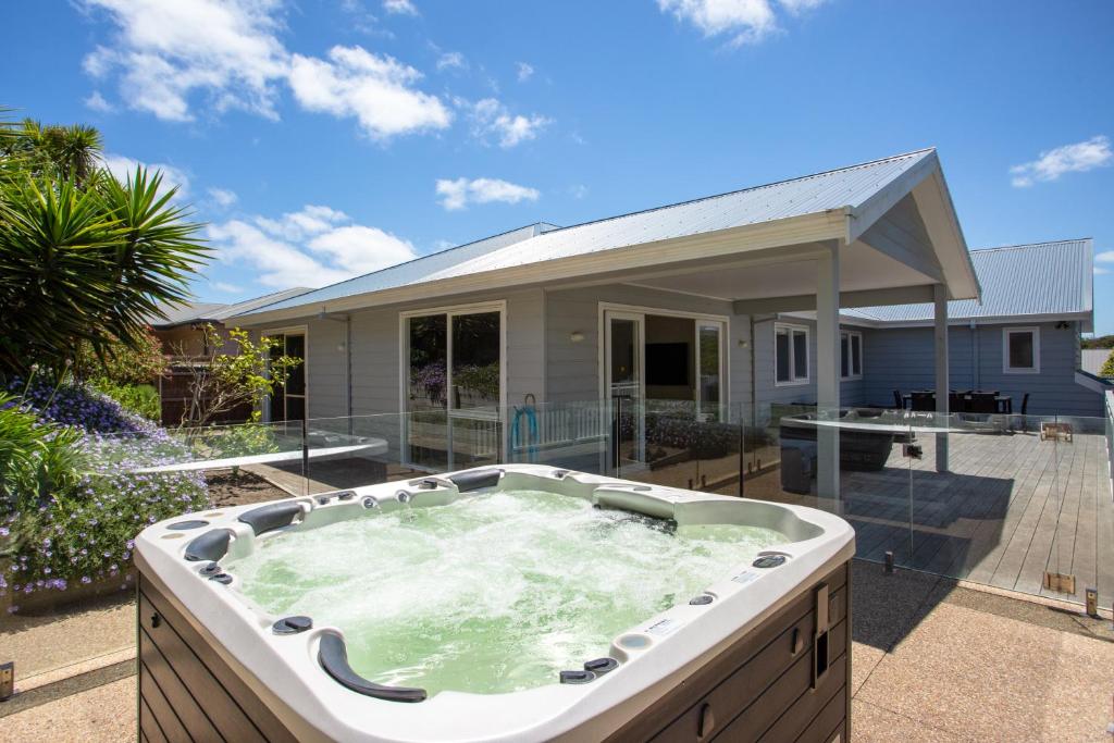 a hot tub in the backyard of a house at Lady Nelson in Sorrento