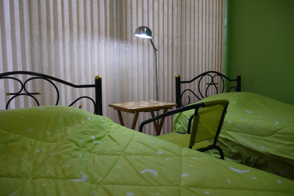 Postel nebo postele na pokoji v ubytování Punnpannsuk