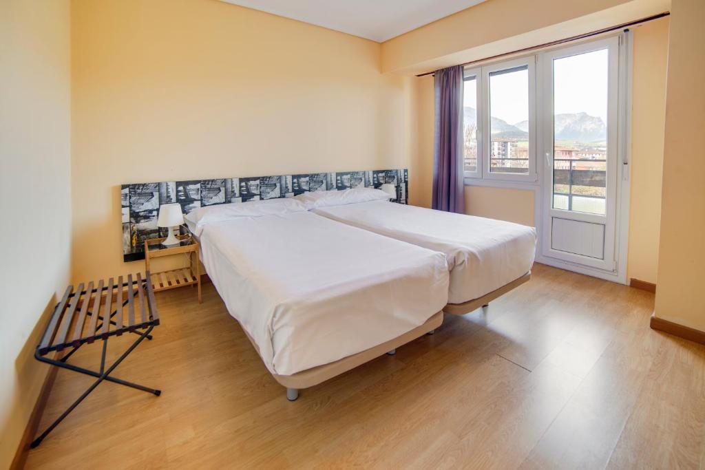 Postel nebo postele na pokoji v ubytování Hotel San Blas