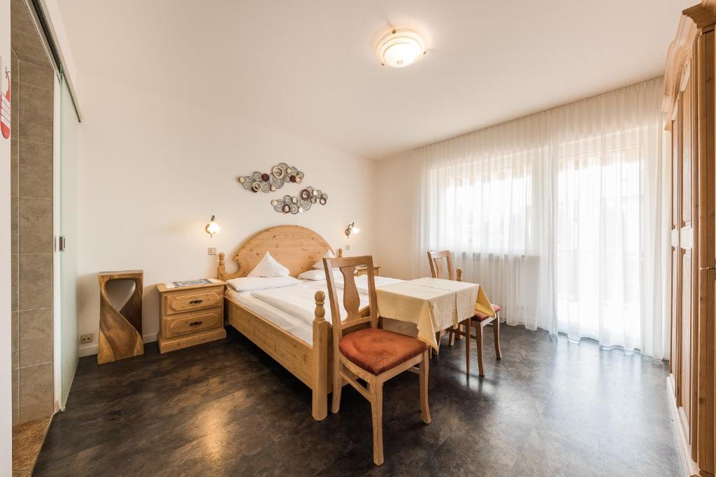 Postel nebo postele na pokoji v ubytování Pension Monika