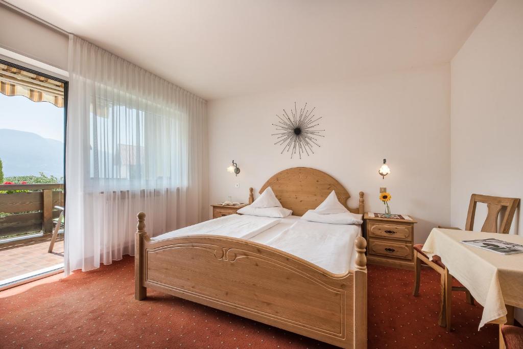 Postel nebo postele na pokoji v ubytování Pension Monika