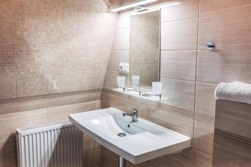 Koupelna v ubytování Star Hotel