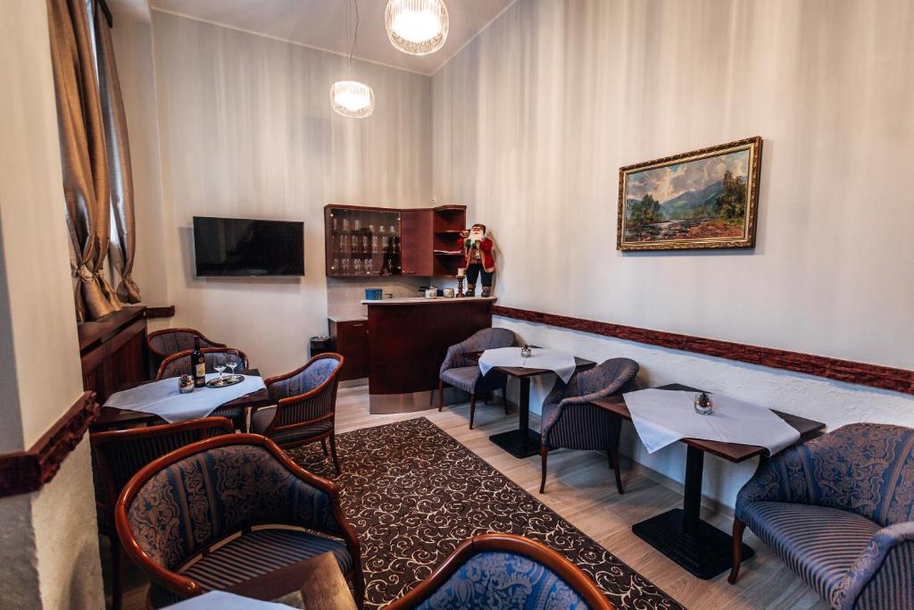 TV a/nebo společenská místnost v ubytování Star Hotel