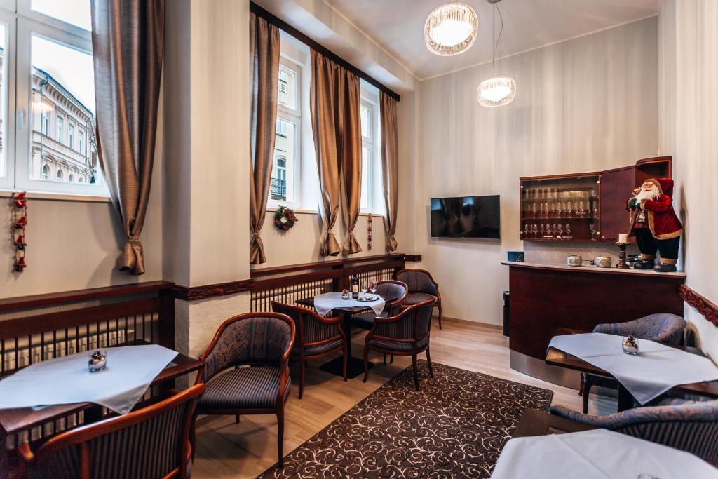 TV a/nebo společenská místnost v ubytování Star Hotel