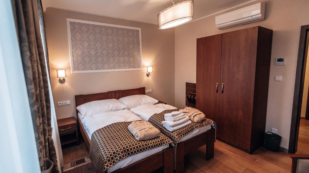 Postel nebo postele na pokoji v ubytování Star Hotel