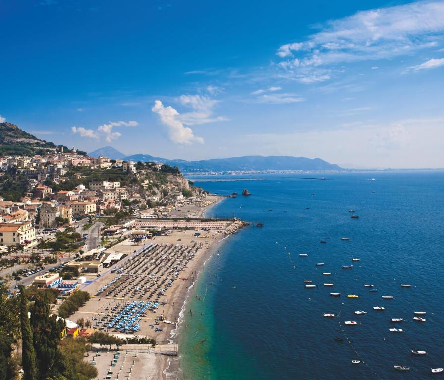 an aerial view of a beach with boats in the water at Hotel Voce del Mare in Vietri sul Mare