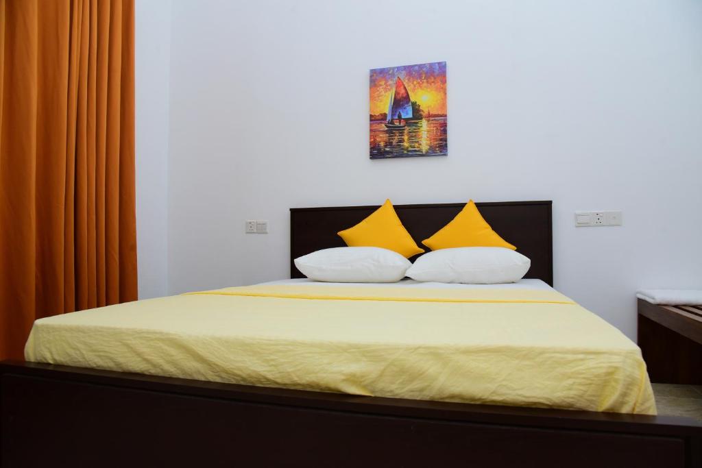 Postel nebo postele na pokoji v ubytování Airport Blessings Villa
