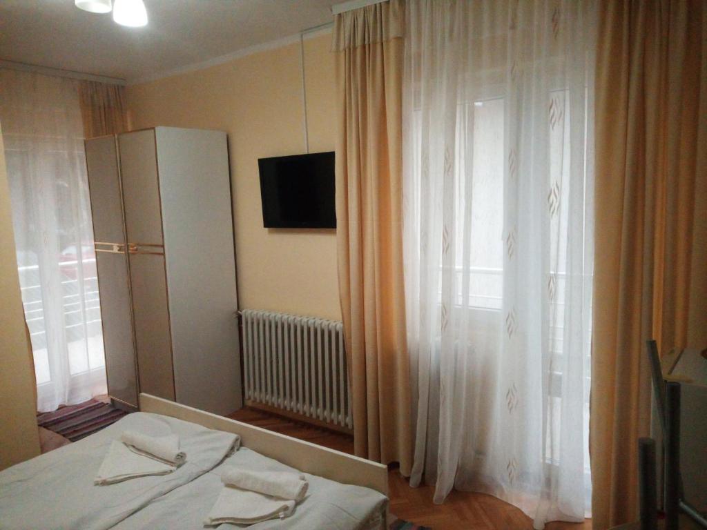 Postel nebo postele na pokoji v ubytování Villa Vlasta