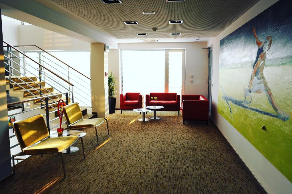 Posezení v ubytování Hotel EMPIRE