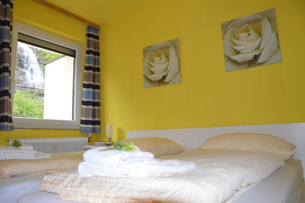 Postel nebo postele na pokoji v ubytování Grenzberg Appartements