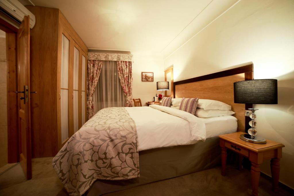Postel nebo postele na pokoji v ubytování Questenberg Hotel