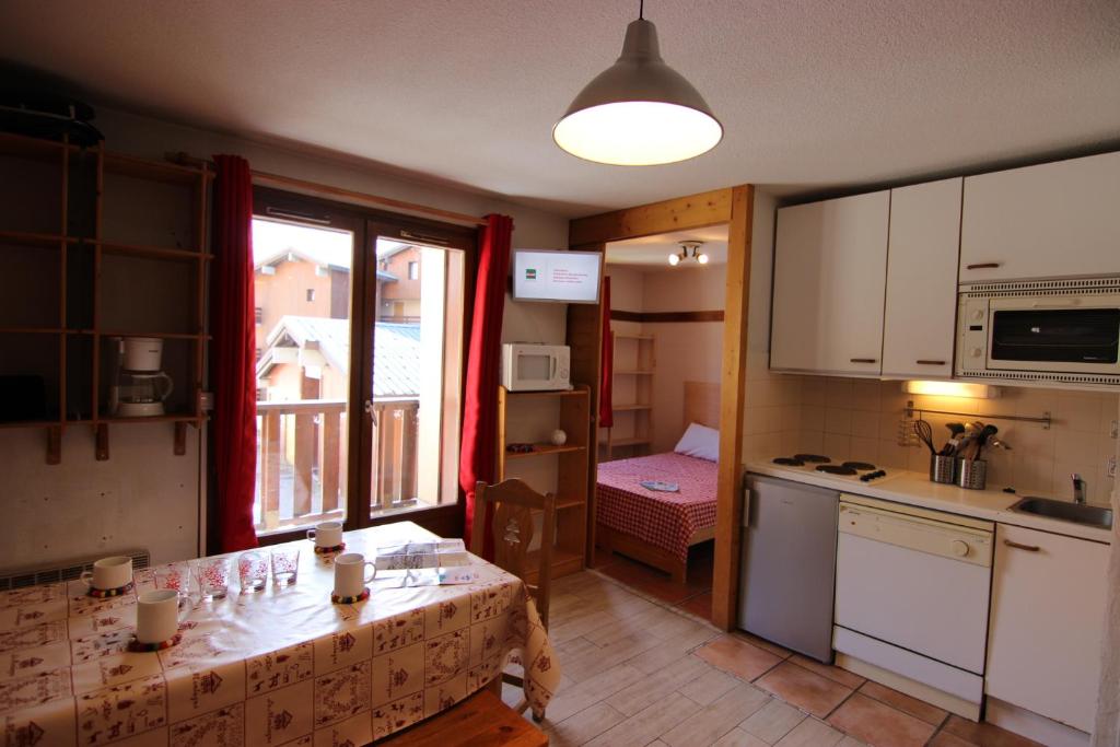 Kuchyň nebo kuchyňský kout v ubytování Reine Blanche Appartements VTI