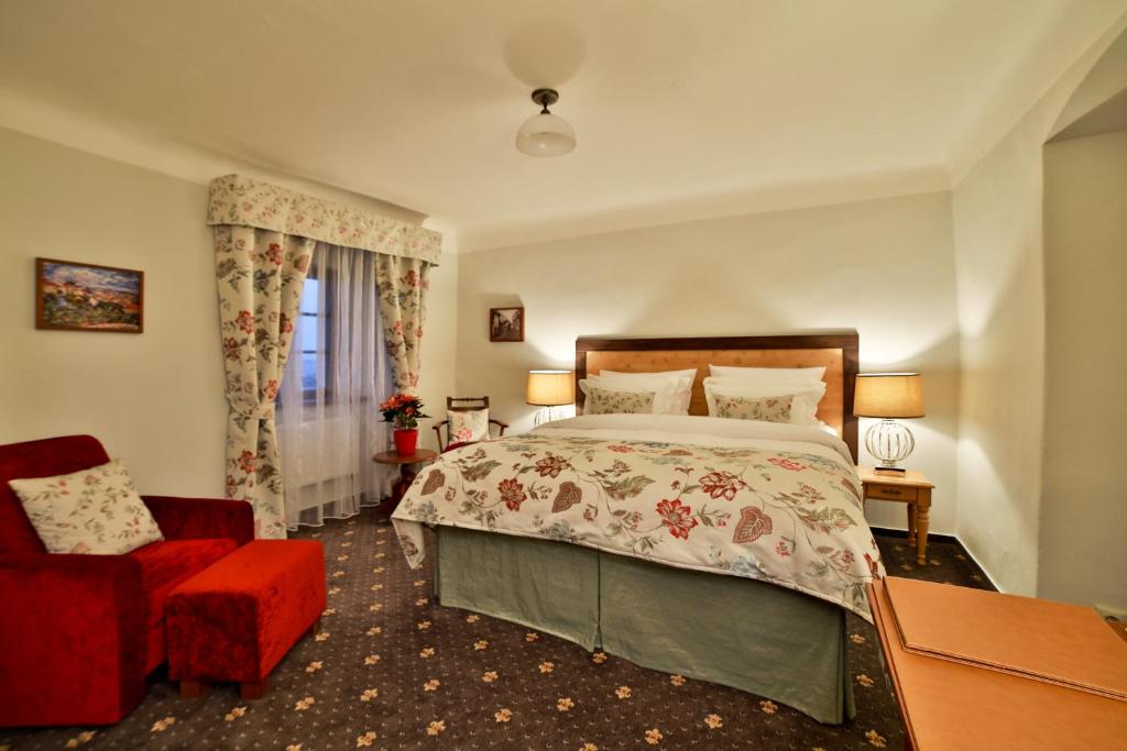Postel nebo postele na pokoji v ubytování Questenberg Hotel