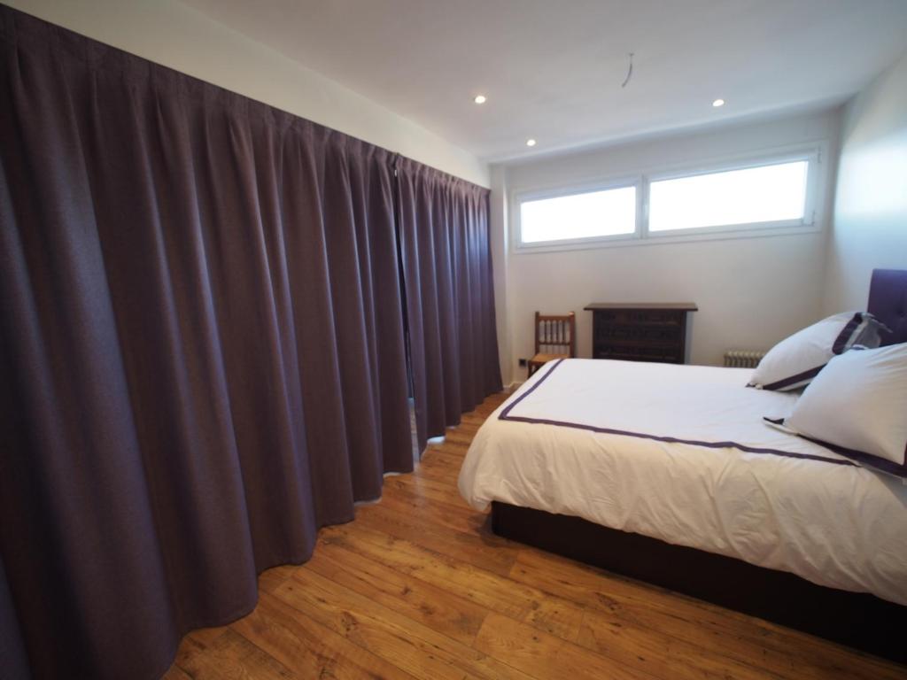 Posteľ alebo postele v izbe v ubytovaní Seafront Apartment in Palamós