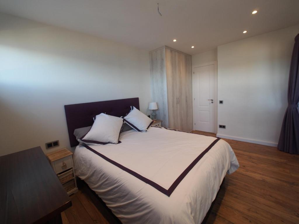 Posteľ alebo postele v izbe v ubytovaní Seafront Apartment in Palamós