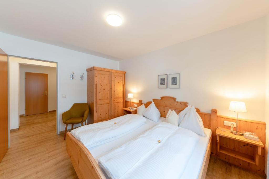 Postel nebo postele na pokoji v ubytování Wawies Apartments