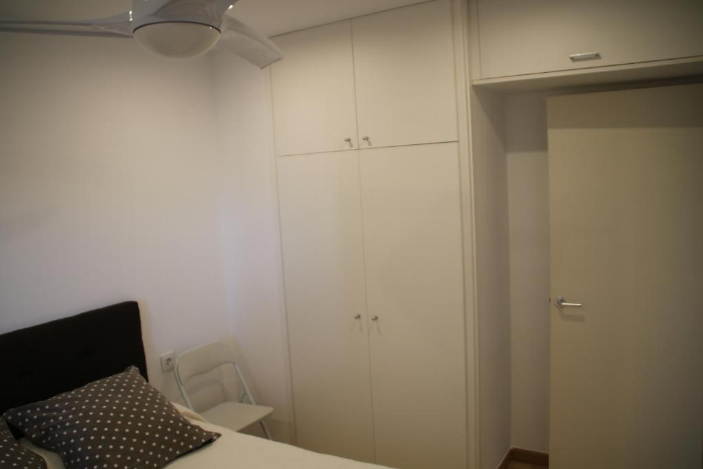 A bed or beds in a room at Centre Empuriabrava plage