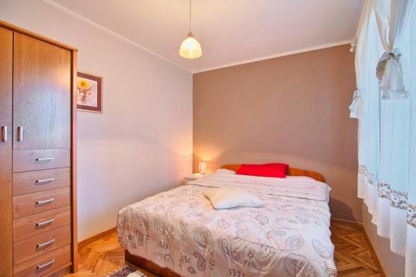 Postel nebo postele na pokoji v ubytování Apartman Turk