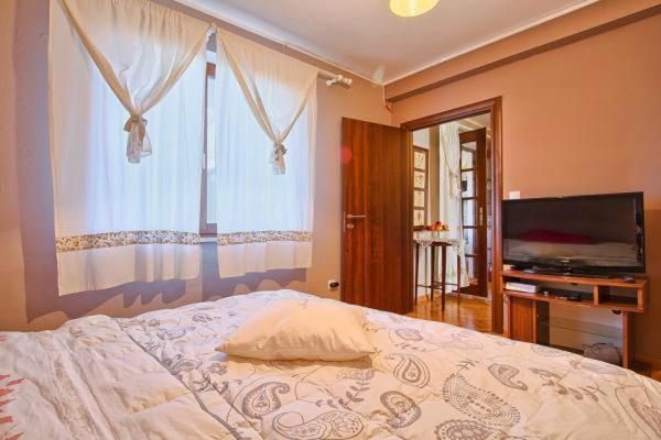 Postel nebo postele na pokoji v ubytování Apartman Turk