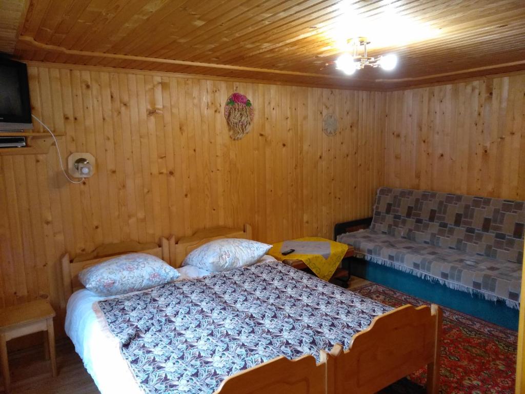 Postel nebo postele na pokoji v ubytování Sadiba Pid Skeleyu
