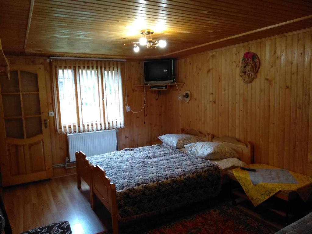 Postel nebo postele na pokoji v ubytování Sadiba Pid Skeleyu