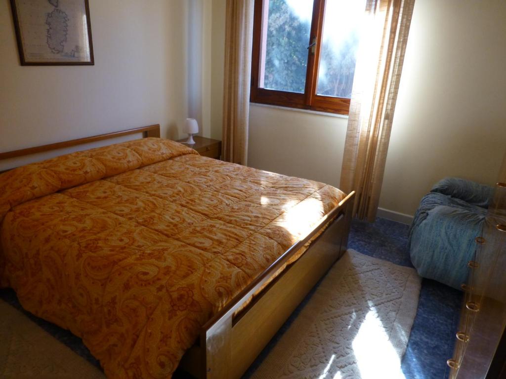 Łóżko lub łóżka w pokoju w obiekcie Casa Vacanza Appartamenti Al Mare