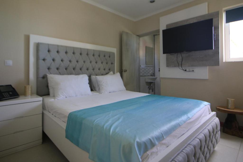 Postel nebo postele na pokoji v ubytování Hotel Islander Bonaire