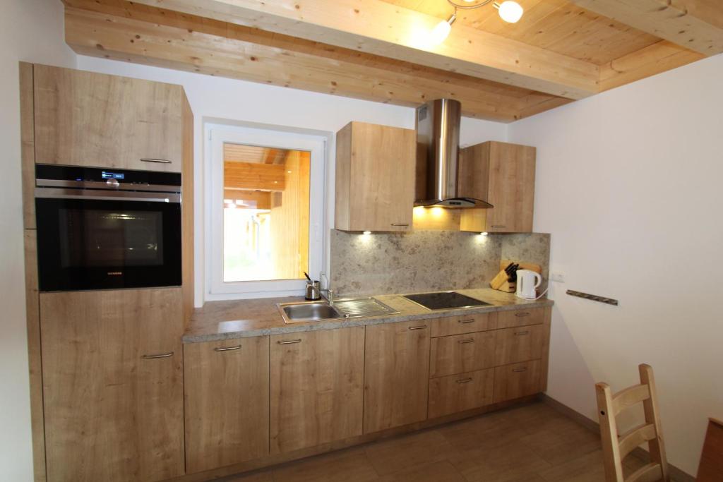 Kuchyňa alebo kuchynka v ubytovaní Chalet Underhill