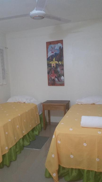 Postel nebo postele na pokoji v ubytování Hostel Quintonido