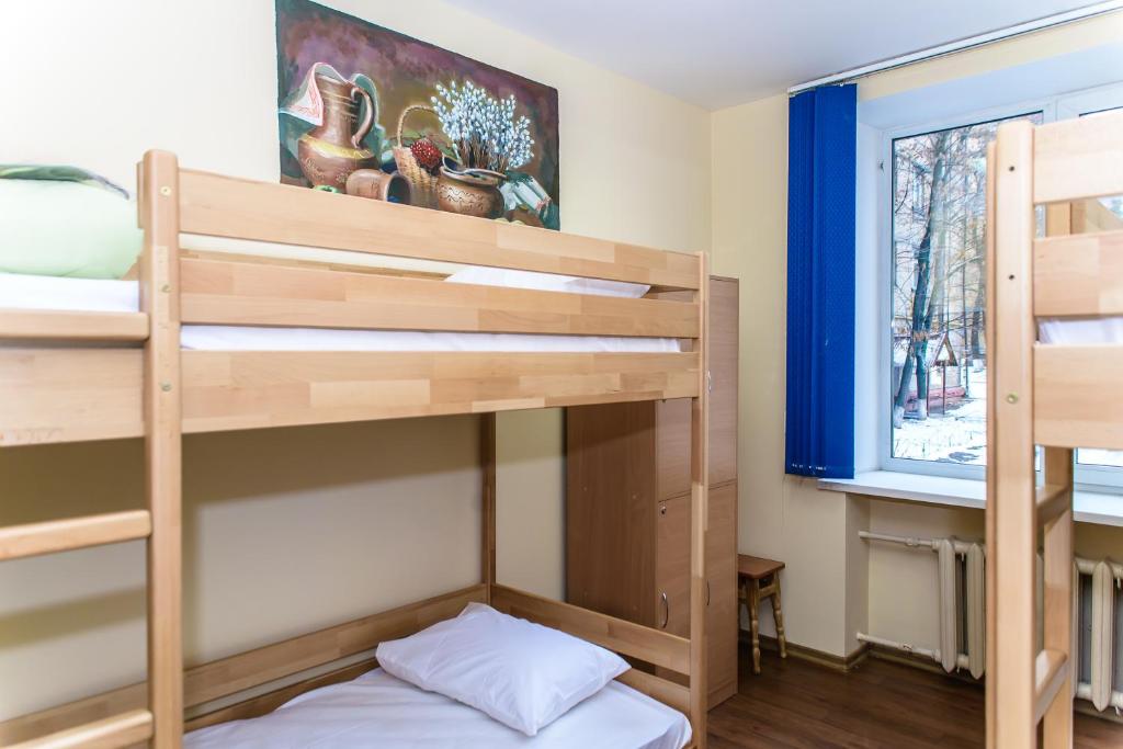 Кровать или кровати в номере BOTANIC GLOBUS HOSTEL