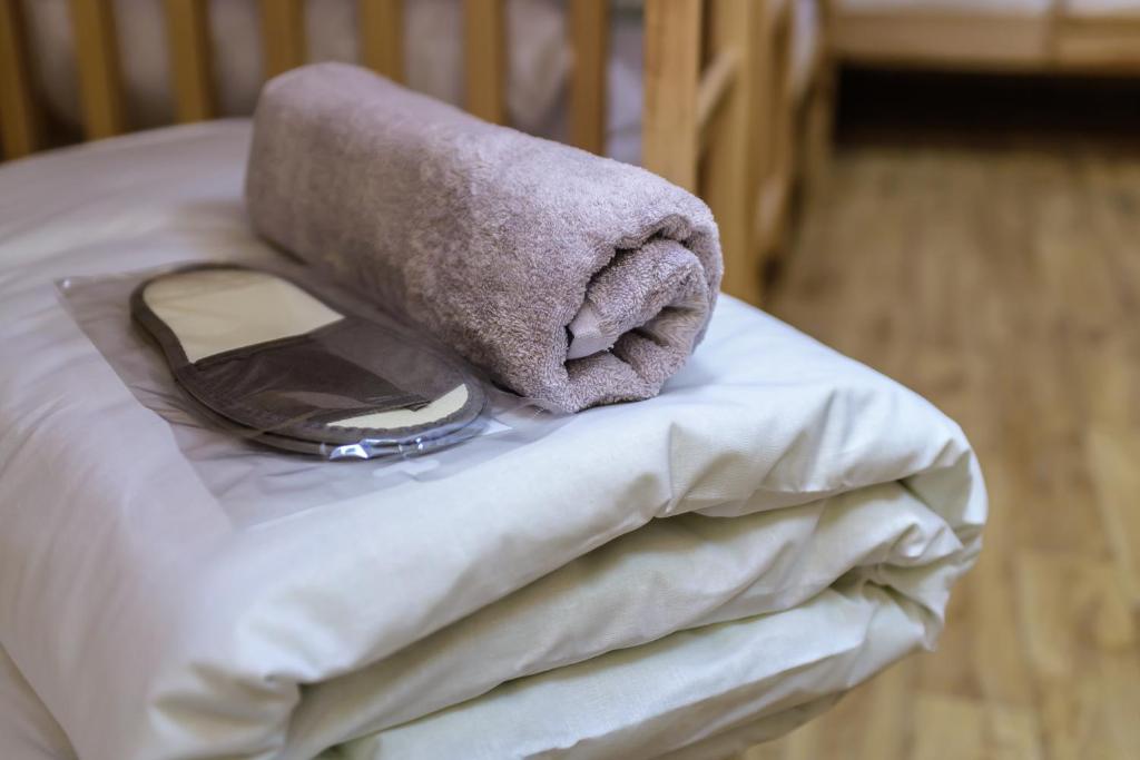 Postel nebo postele na pokoji v ubytování BOTANIC GLOBUS HOSTEL