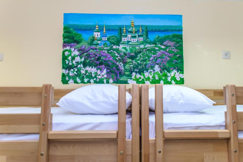 Postel nebo postele na pokoji v ubytování BOTANIC GLOBUS HOSTEL