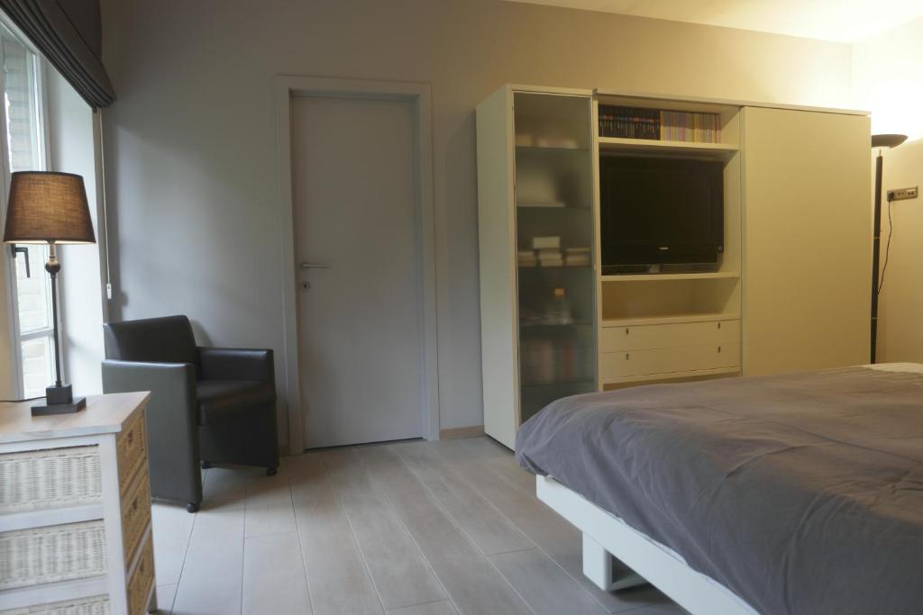 Postel nebo postele na pokoji v ubytování Villa Kokeliko