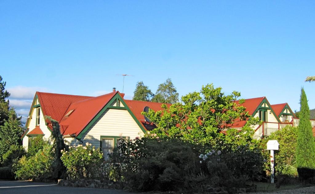 a row of houses with red roofs at Crabtree House in Huonville