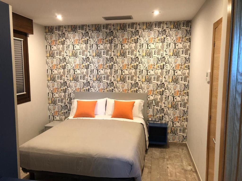 Кровать или кровати в номере Caracola de Cabo Home