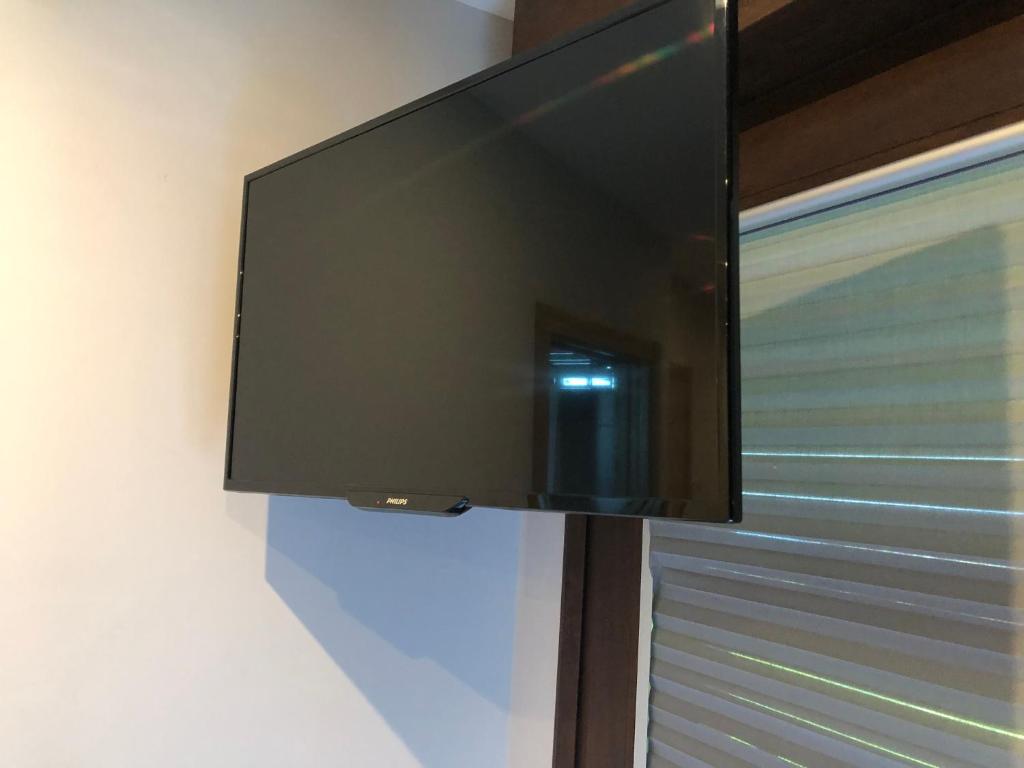 Телевизор и/или развлекательный центр в Caracola de Cabo Home