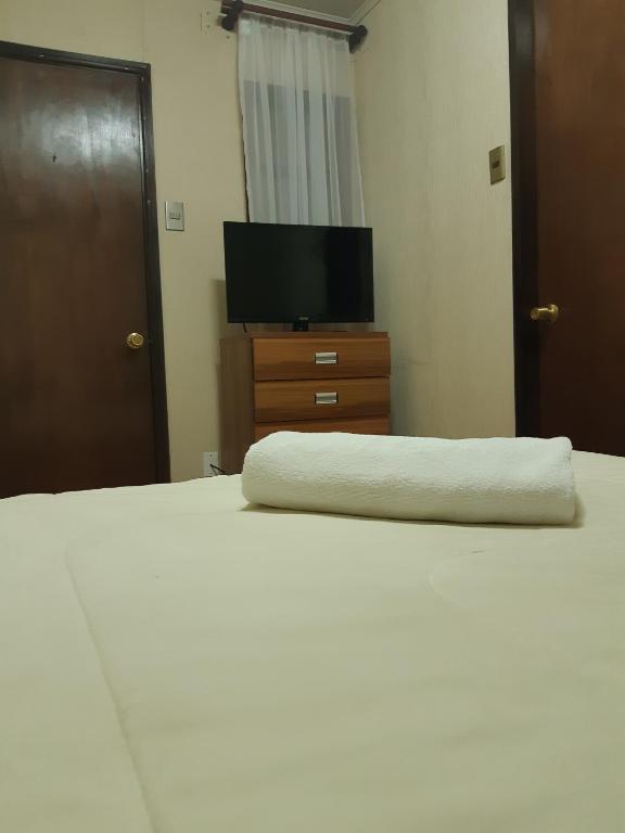 Postel nebo postele na pokoji v ubytování Agostini Hotel