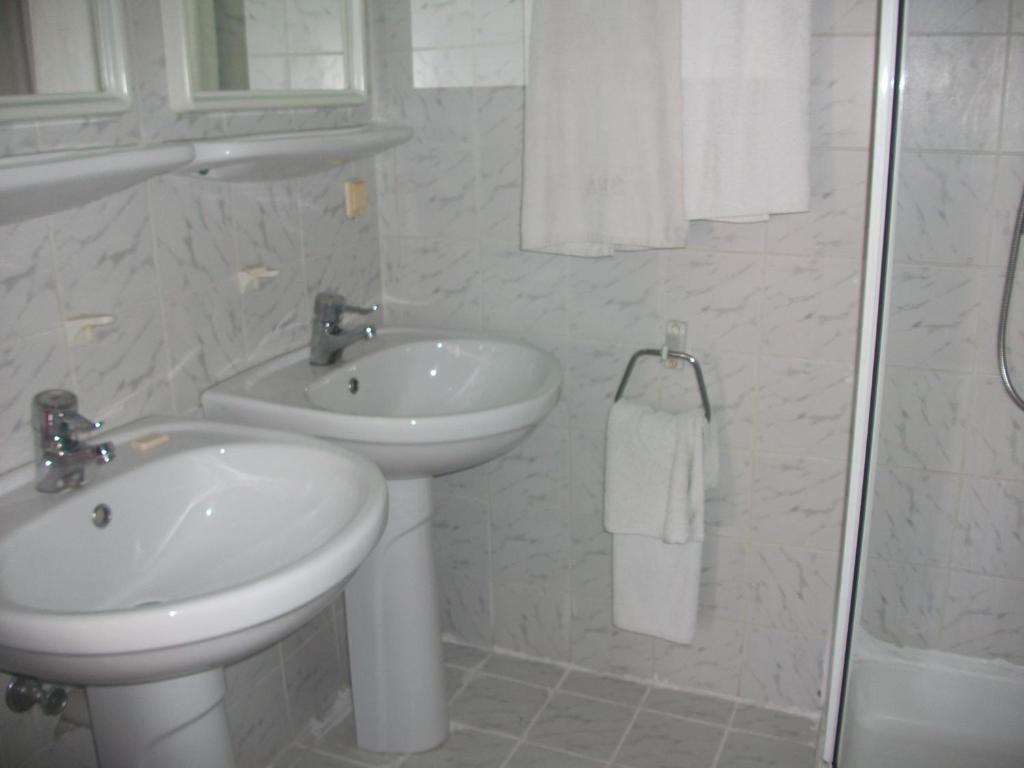Koupelna v ubytování Delphin Apart Hotel