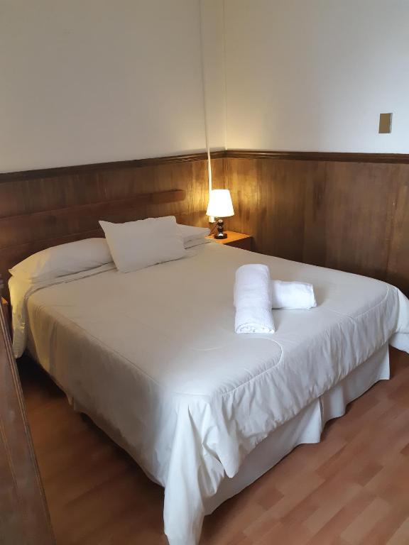 Postel nebo postele na pokoji v ubytování Agostini Hotel