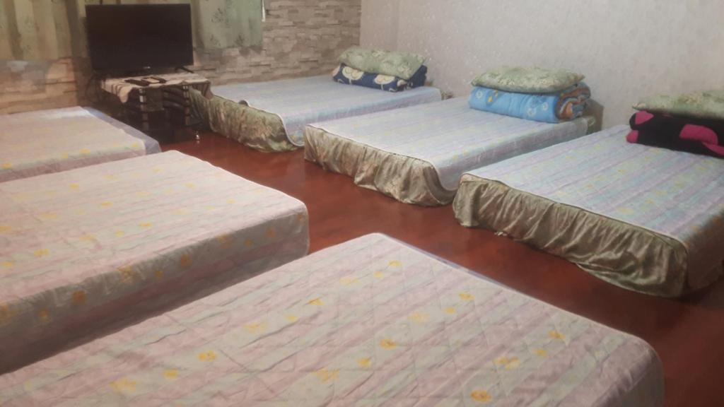 Postel nebo postele na pokoji v ubytování Dai Yi Shia B&B