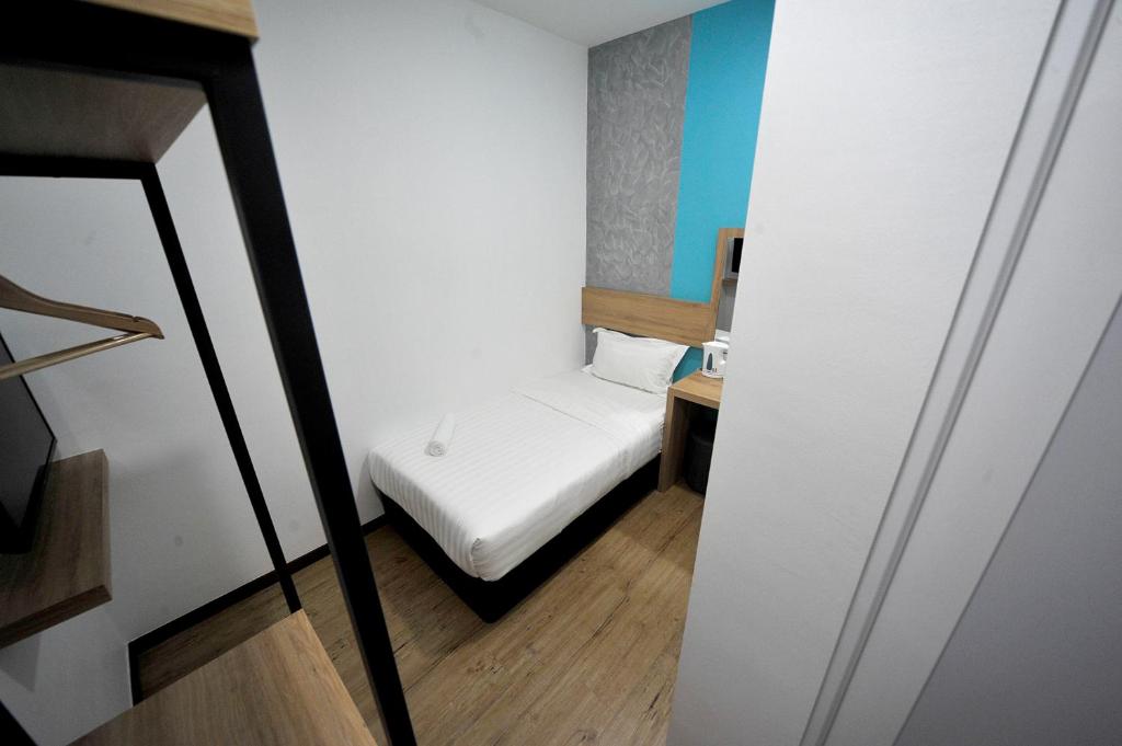 Postel nebo postele na pokoji v ubytování MYe Hotel