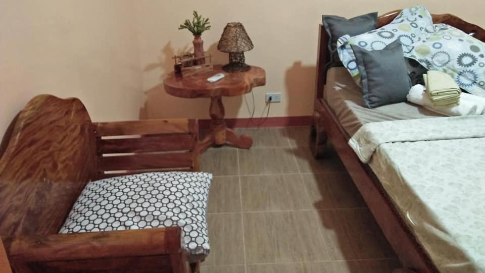 Postel nebo postele na pokoji v ubytování Anvel Homestay
