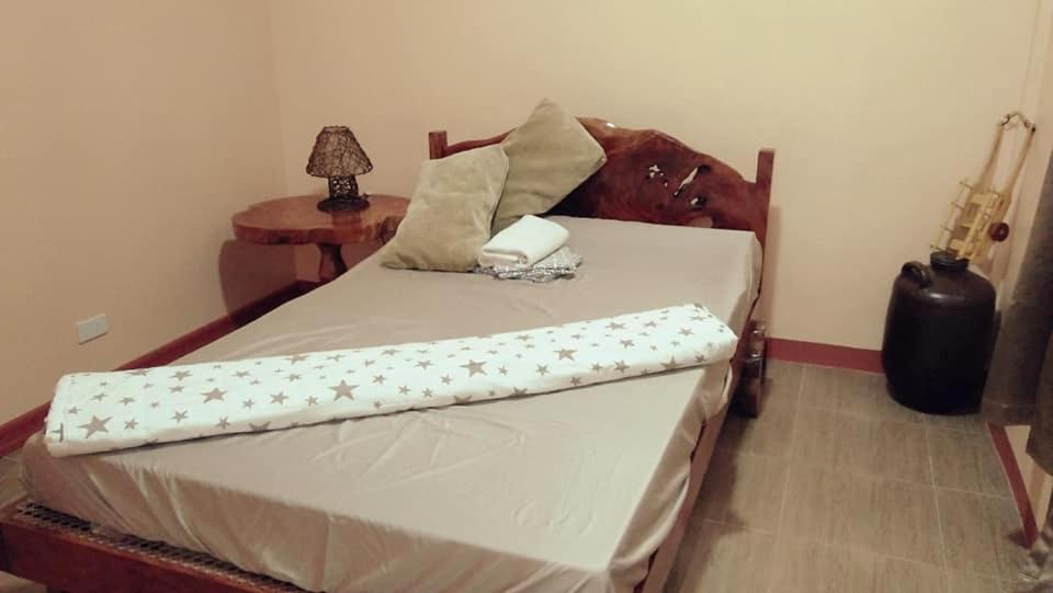 Postel nebo postele na pokoji v ubytování Anvel Homestay