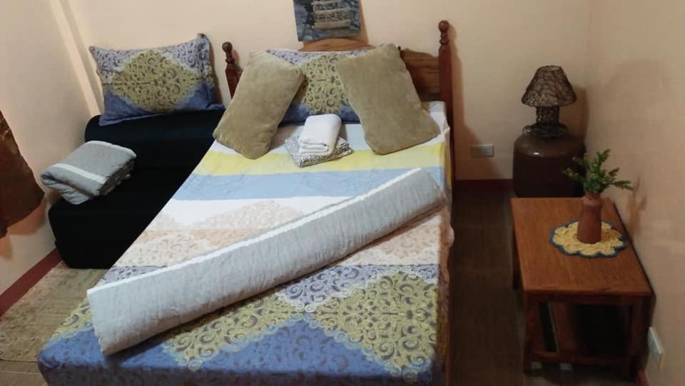 Postel nebo postele na pokoji v ubytování Anvel Homestay