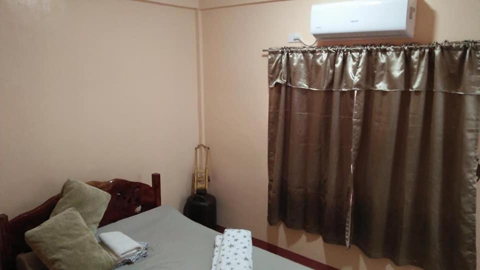 Postel nebo postele na pokoji v ubytování Anvel Homestay