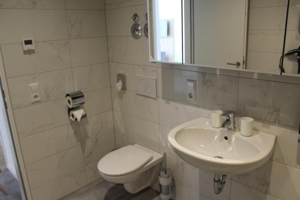 Koupelna v ubytování Hotel Lumi