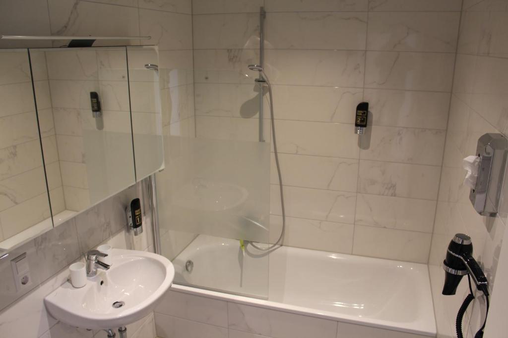 Koupelna v ubytování Hotel Lumi
