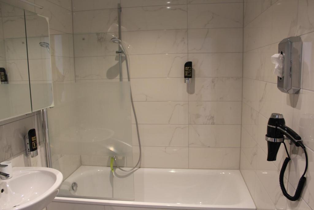 Koupelna v ubytování Hotel Lumi