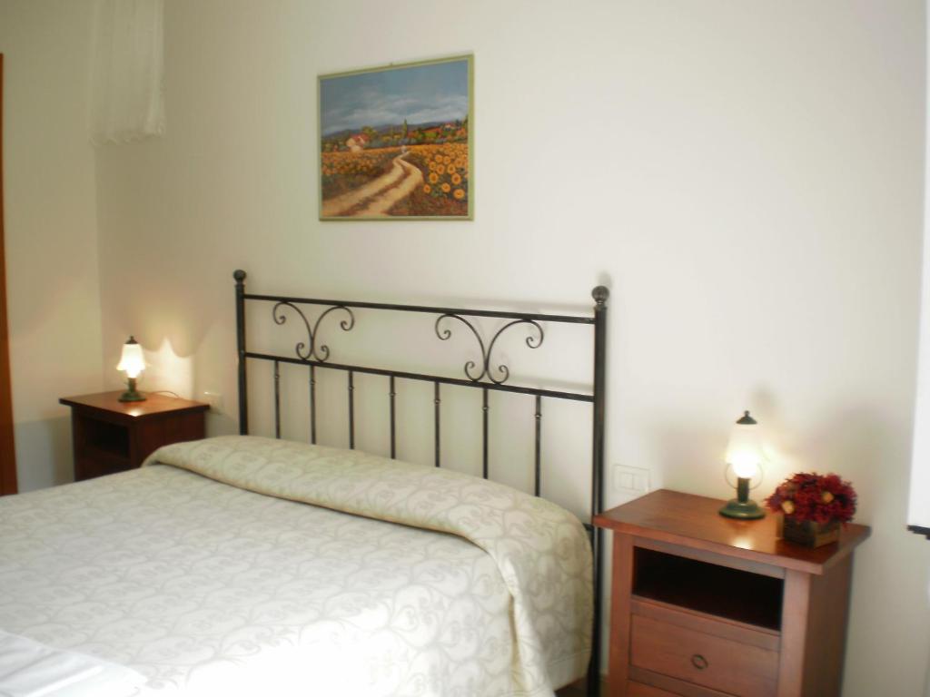 Postel nebo postele na pokoji v ubytování Hotel Paese Corvara
