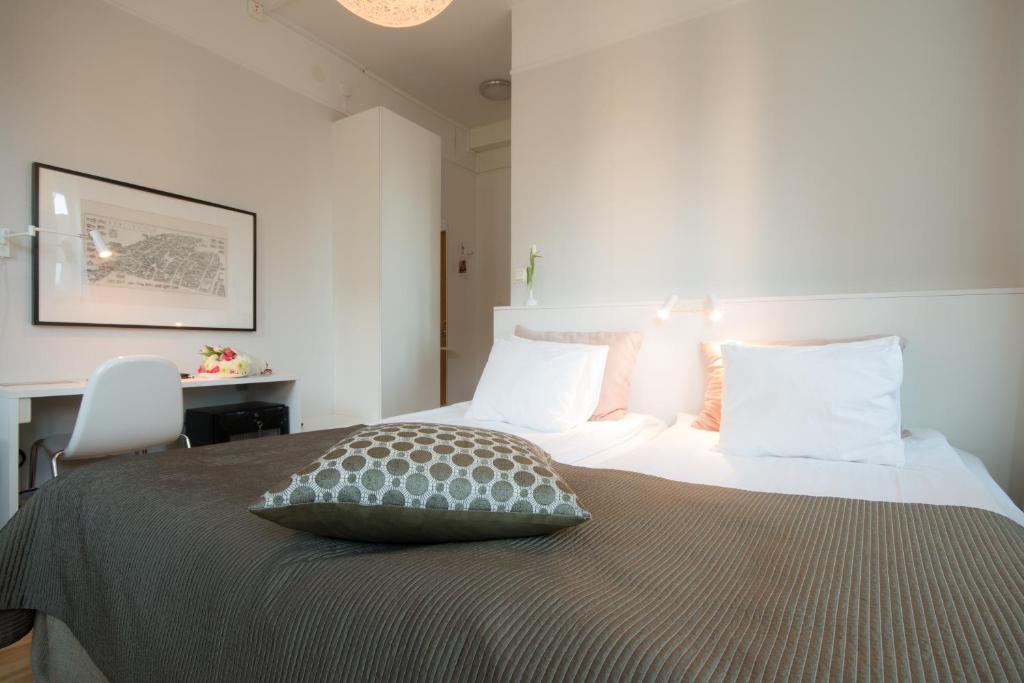 Postel nebo postele na pokoji v ubytování Hotell Aston